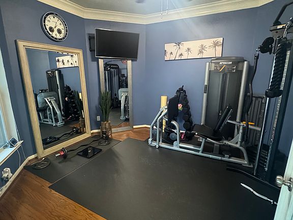Flex room used as home gym. May be used as a study or third bedroom.