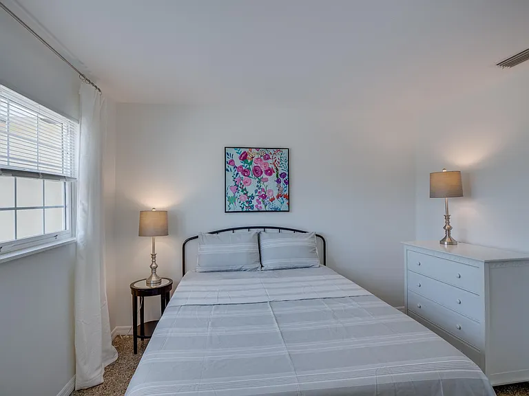 Furnished bedroom #2 with access to completely remodeled Jack & Jill bath