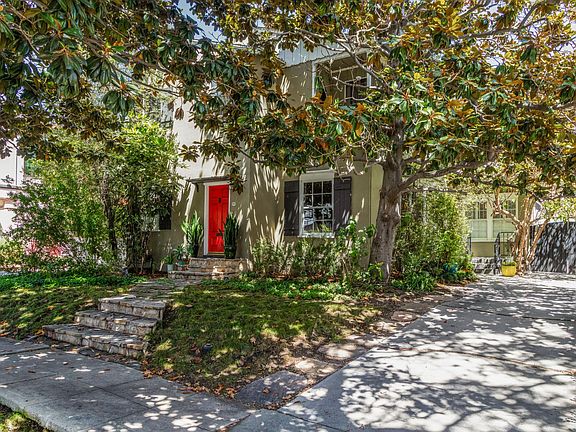 Front of building - and parking for 2 cars tandem.