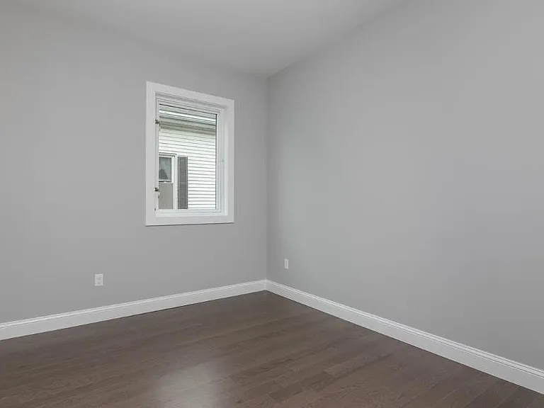 Bedroom #1. Fits a queen sized bed and dresser. Has custom California Closet design in closet.