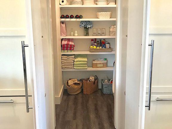 Large hidden walk-in pantry 