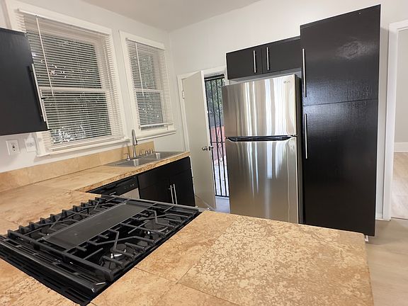 Kitchen view. From the kitchen you walk out to a private yard.