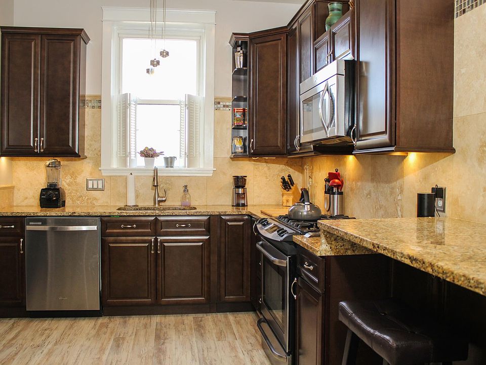 bright kitchen with bar