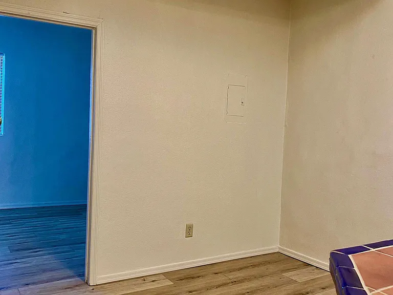 View into living room into bedroom 3