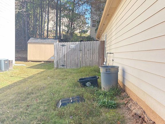 Entrance to the backyard from the left of the house