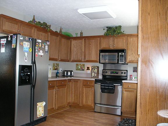 Stainless steel kitchen with laminate flooring