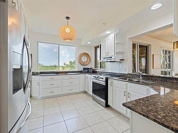 4th image of 4737 DOLPHIN CAY LANE S #401