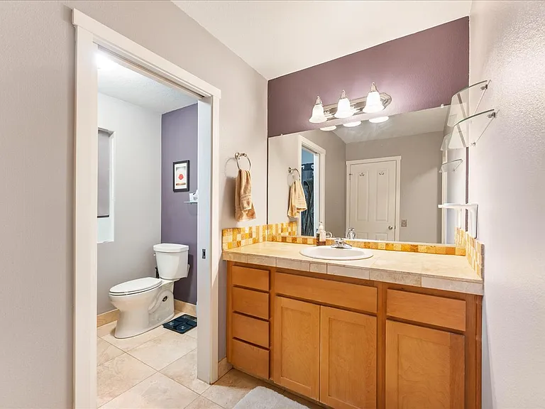 8594 NE Adlington St — Photo 11