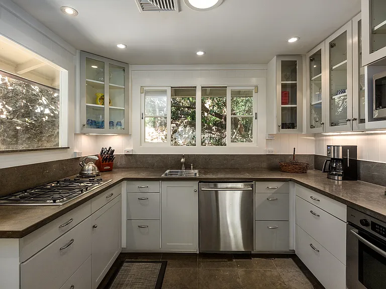 Well equipped kitchen excellent natural lighting