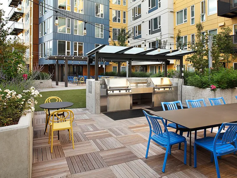 Outdoor lounge with BBQ grills