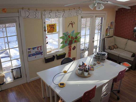 Sun porch with french doors to the garden.