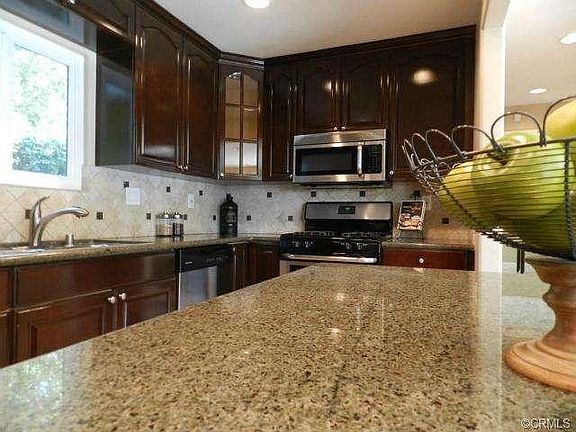 Family Room with Fireplace and Nice Tile Flooring