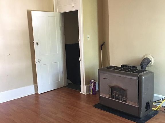 Living room and door to the stairs.