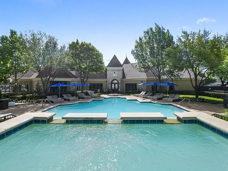 Two Sparkling Pools with Sundeck.