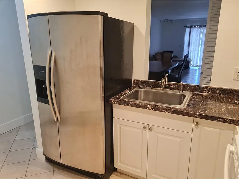 300 Golden Isles Dr #104 — Photo 4