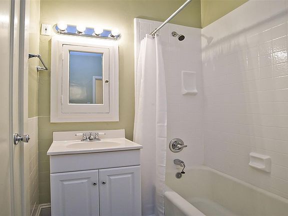 Bathroom with tub and shower.