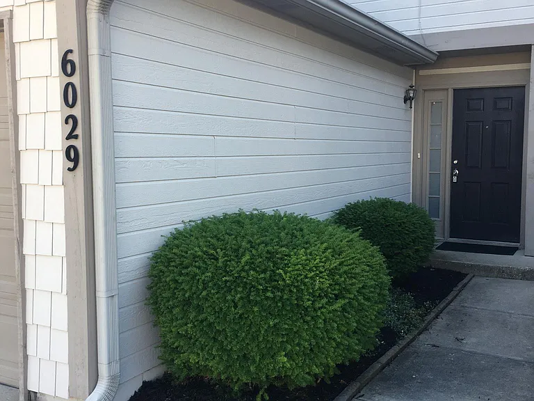 Private entrance with 1 car attached garage