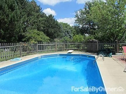 View of pool from shallow in toward deep end. 