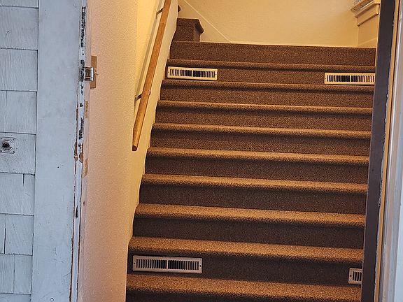 10 stair entrance totally separated from main floor tenant.