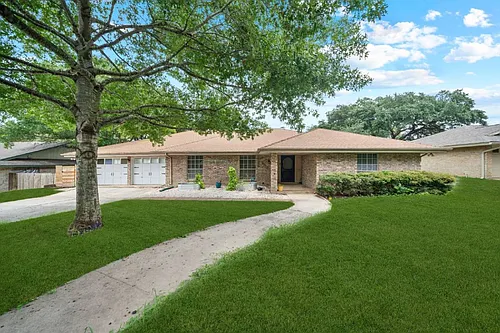 6015 Windhaven Dr Photo 1