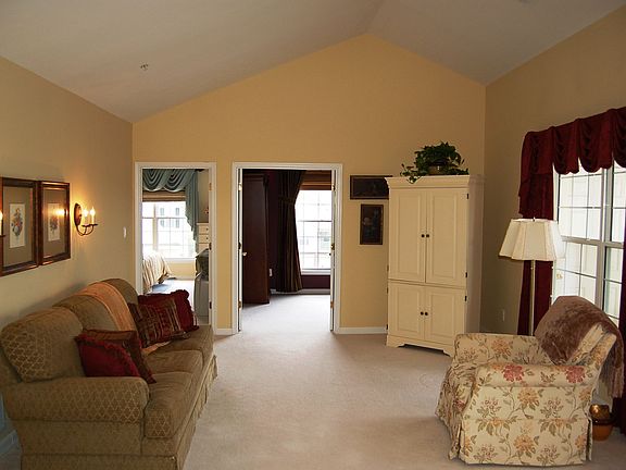 Spacious living room with cathedral ceiling