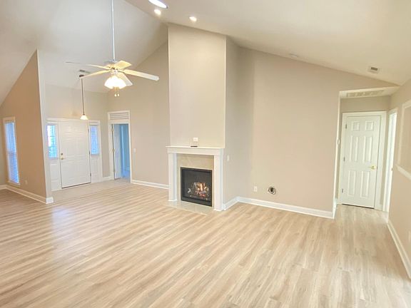 Living Room
Front Bedrooms through open door on left