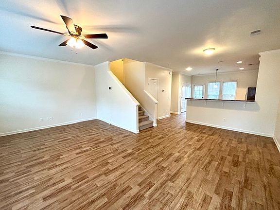 Living room with stairs to the second floor