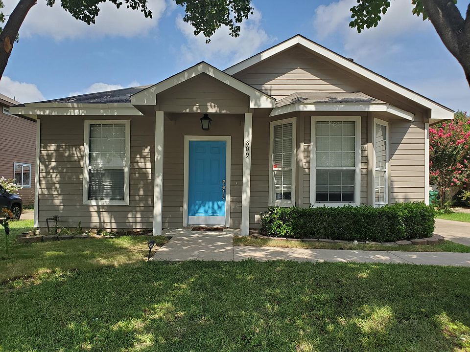 Front of home. Exterior has fresh paint and gutters installed on whole house (added after this photo)
