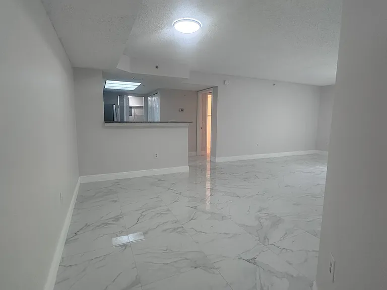 5011 Wiles Rd #207 — Photo 10