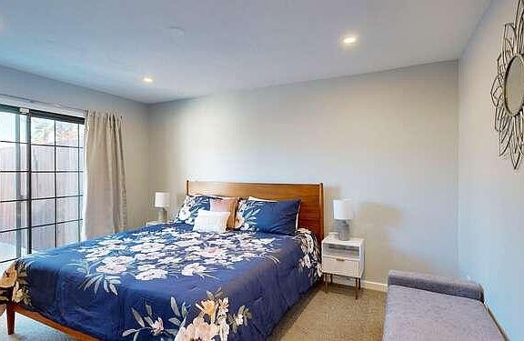 Bedroom #2 has a full size bed and a patio off this room.