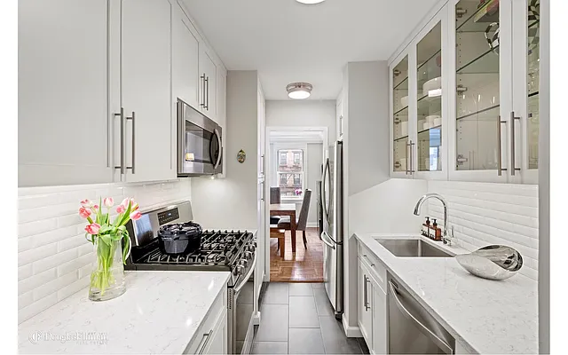 Sold by Douglas Elliman | media 11