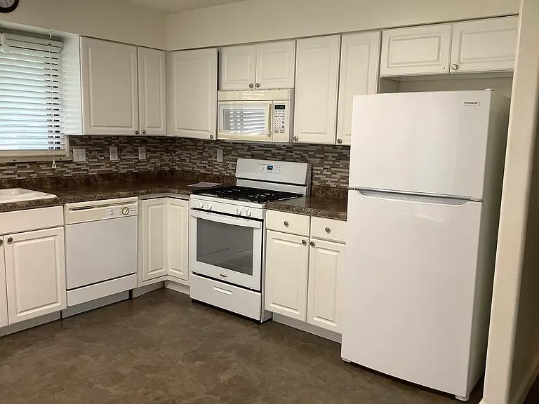 Kitchen large area for table & chairs and brand new plank floors