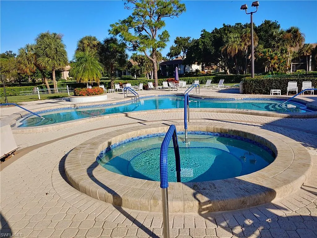 Quiet relaxing salt water pool area. - 507 Lake Louise Cir #202