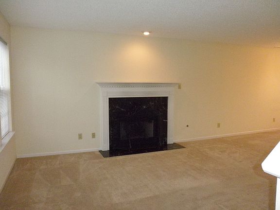 View of living room with fireplace