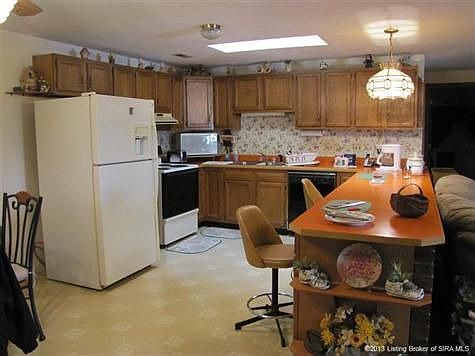 Large kitchen with breakfast bar.