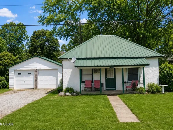 104 S College, Liberal, MO 64762