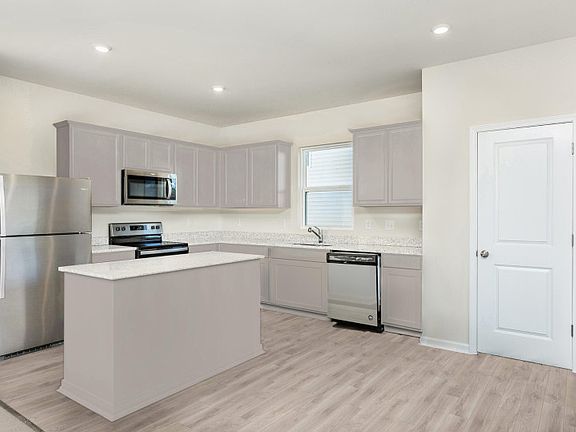 Package B Kitchen with beautiful gray cabinets and granite countertops - Model Representation