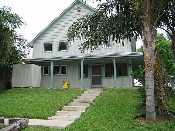 REAR OF HOME, NICELY LANDSCAPED