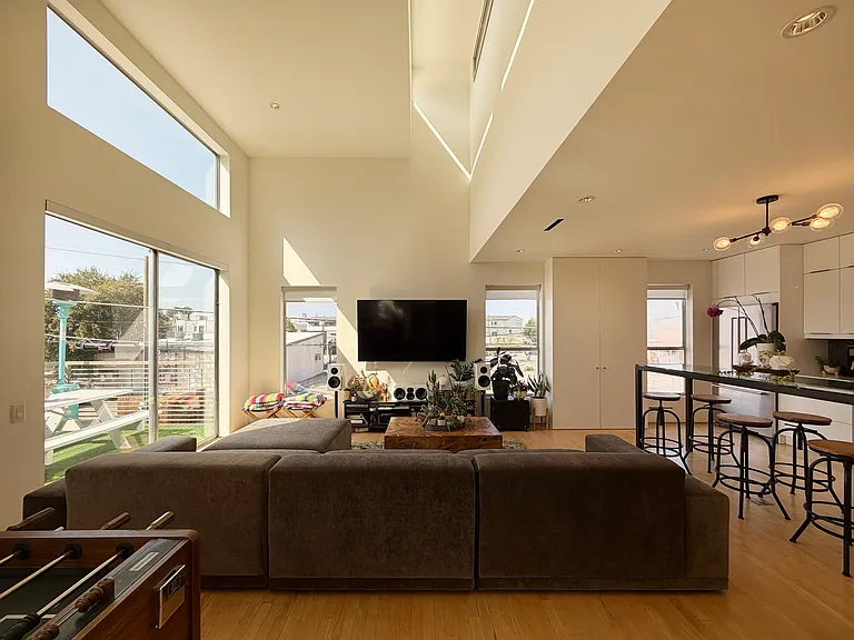 3 stories. Second story living room ceilings expand to 18 feet.