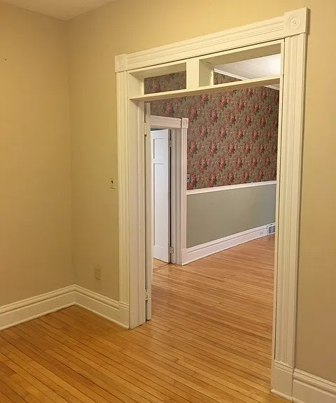 looking from the main floor bedroom into the dining room