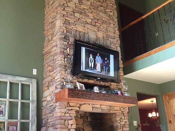 Living room rock fireplace 