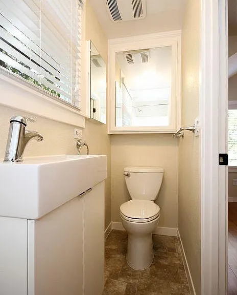 Upstairs bath with shower.