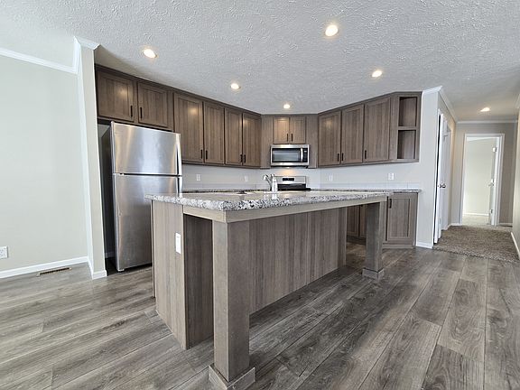 3rd image of 7204 E Grand River Ave Lot 420