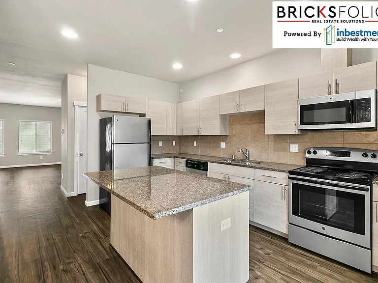 Beautiful kitchen with tons of cabinets.