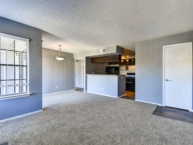 Open-concept layout connecting dining and living spaces_perfect for entertaining or relaxing at home.