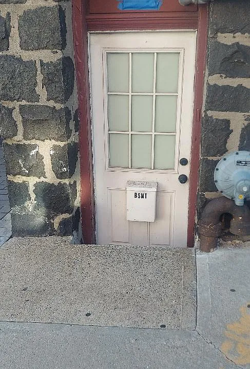 Separate entrance to basement apartment on 72nd Street.