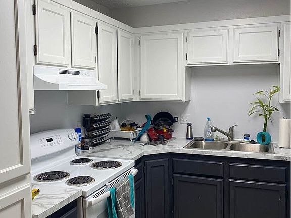 Kitchen with 2 refridgerators