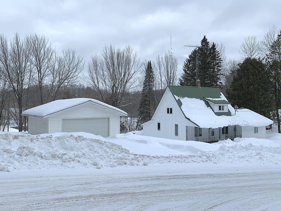 Completely remodeled lake front home with a detached 2 car garage.