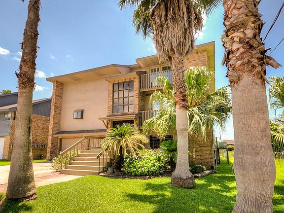 Welcome home to 84 Harbor Lane in Kemah.