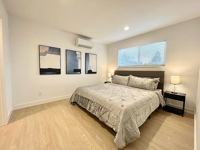 1st Bedroom downstairs with King size bed and walk in closet